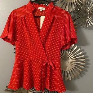 Brand New with Tags. Red polka dot criss cross shirt.